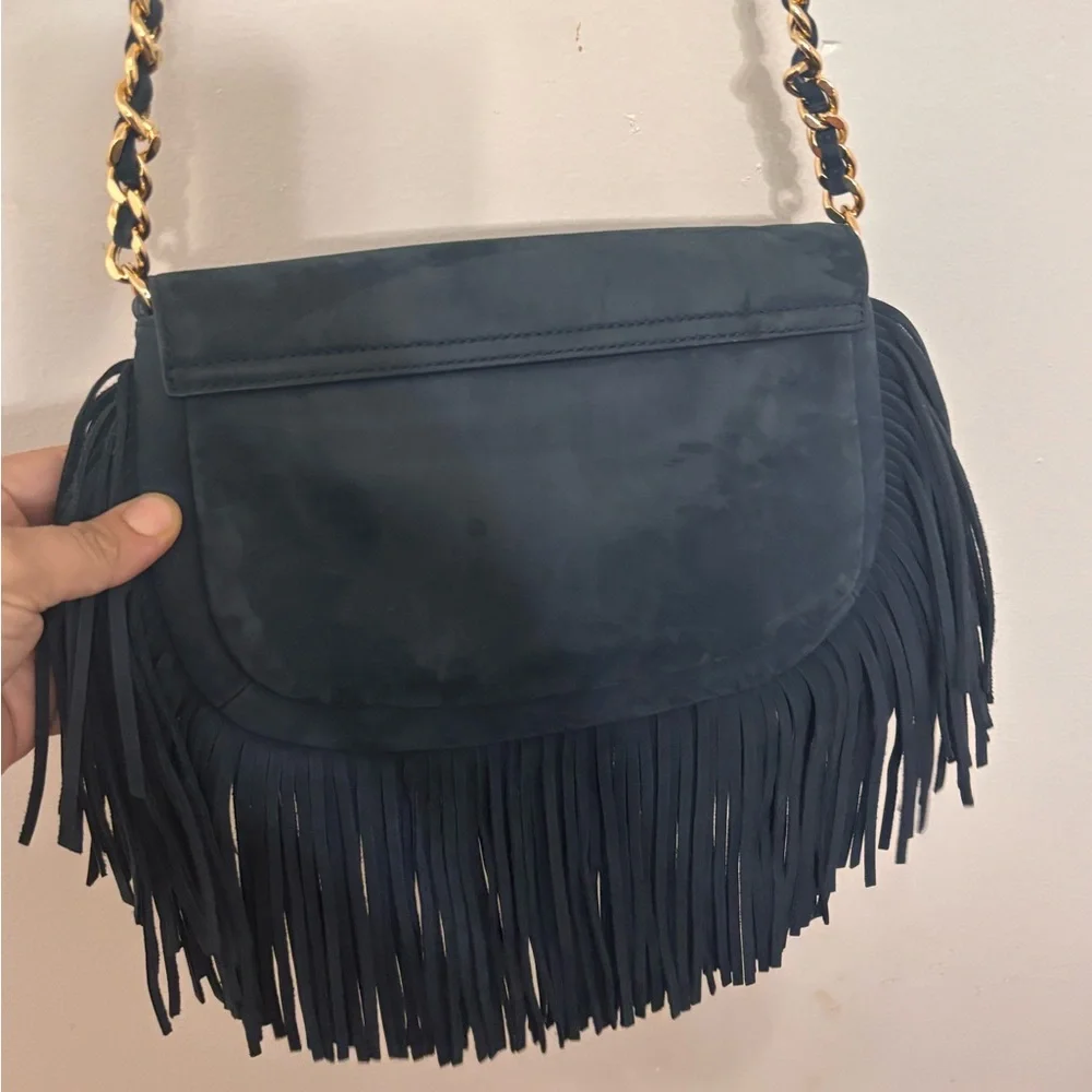 “Tory Burch Fleming Suede Fringe Crossbody Bag – Navy Blue”

• - Picture 5 of 10